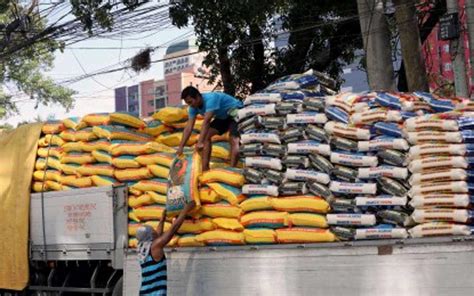 Lower rice import tariff extension recommended .